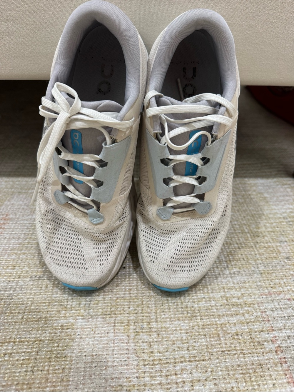 On Running Women's White Running Shoes with Light Blue Accents